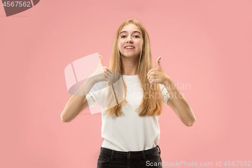 Image of The happy business woman standing and smiling