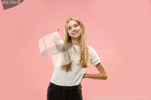 Image of The happy business woman standing and smiling