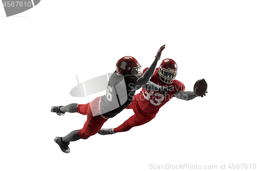 Image of The two american football players studio isolated on white background