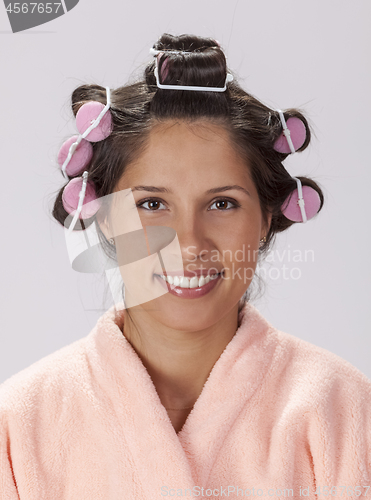 Image of Portrait of a Woman with Curlers