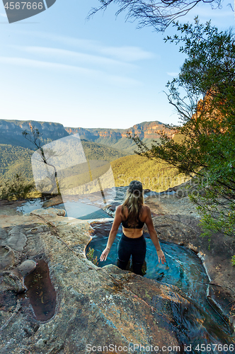 Image of Enjoying plunge pools at end of canyon with mountain vista