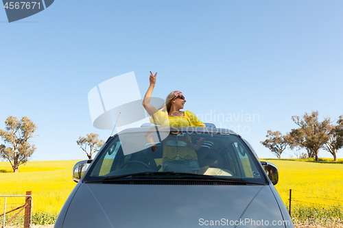 Image of Female good vibes road trip rural countryside