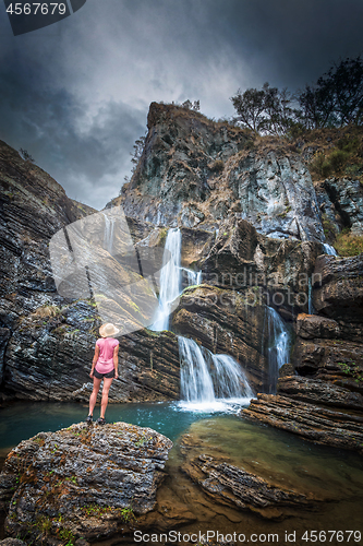 Image of Moody skies, limestone cliffs, waterfalls and blue waterholes