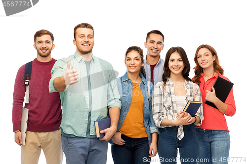 Image of group of smiling students showing thumbs up