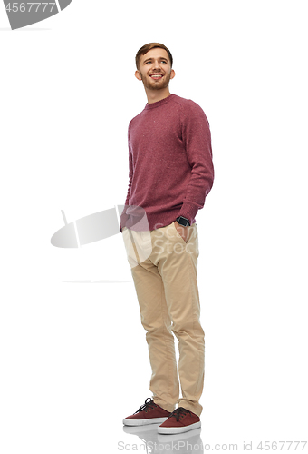 Image of smiling young man over white background