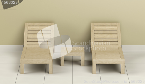Image of Wooden sun loungers and table