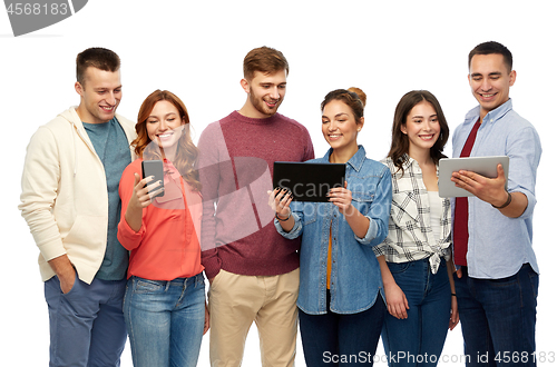 Image of friends with smartphone and tablet computers