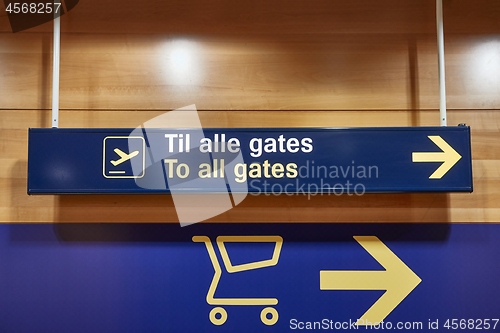 Image of Airport terminal direction signs