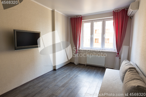 Image of Interior of a modest room in an apartment for rent