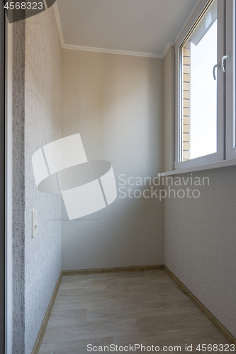 Image of Small glazed balcony in the apartment of a residential building