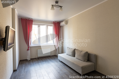 Image of The interior of a small modest room in a hotel