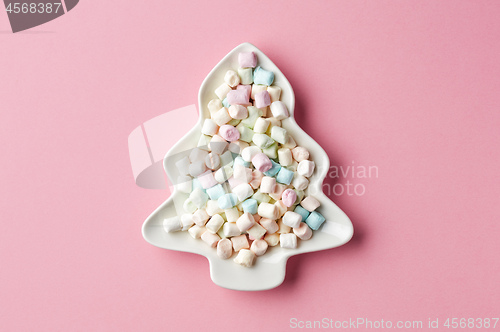 Image of mini marshmallows on fir shape plate