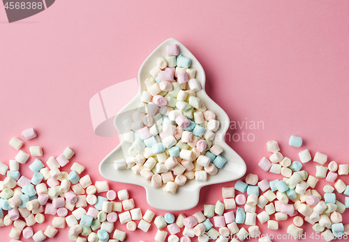 Image of mini marshmallows on fir shape plate