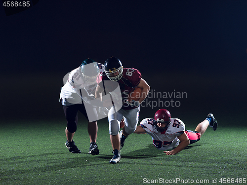 Image of American football players in action