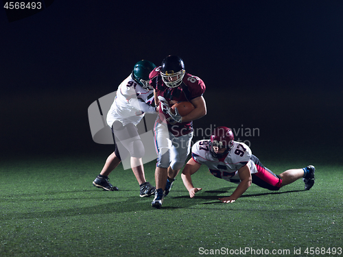 Image of American football players in action