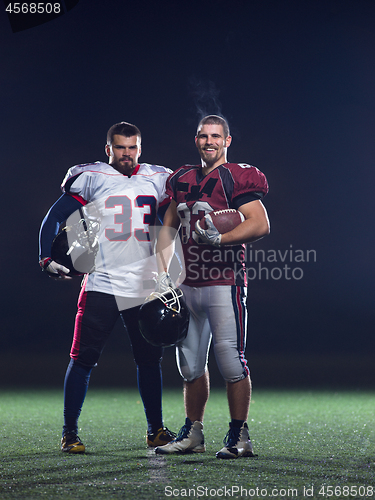 Image of portrait of confident American football players