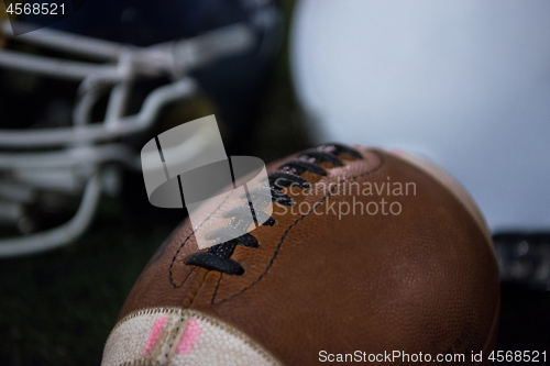Image of american football and helmets