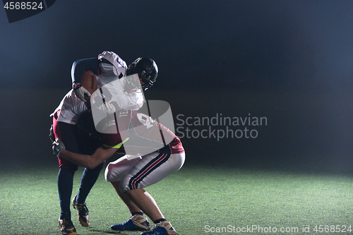 Image of American football players in action