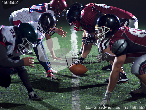 Image of american football players are ready to start