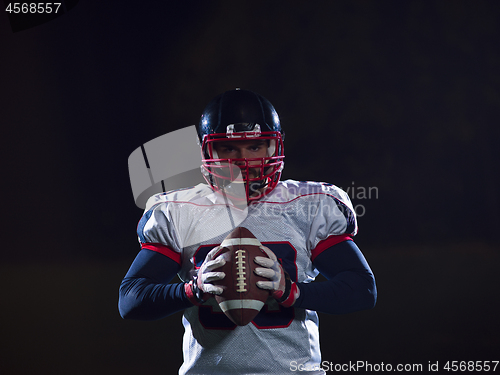 Image of portrait of confident American football player