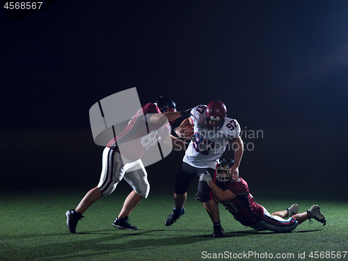 Image of American football players in action