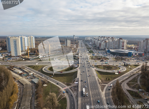 Image of Modern city with of Odessa square and road in the form of a quatrefoil on a background of a cloudy sky . Aerial view from the drone. Kiev, Ukraine