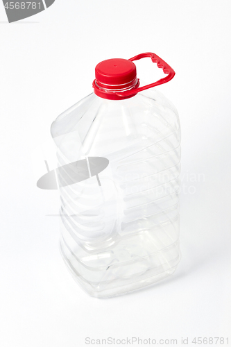 Image of Big plastic bottle for different liquid on a light background. Mock-up.