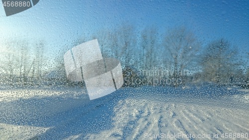 Image of Blurred background with drops on glass