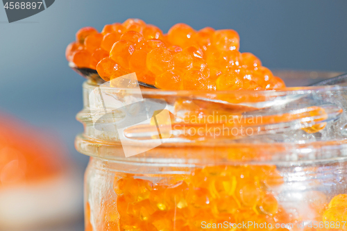 Image of Macro shot of red caviar on jar