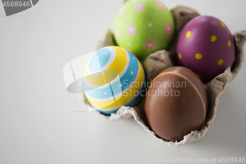 Image of close up of chocolate and colored easter eggs