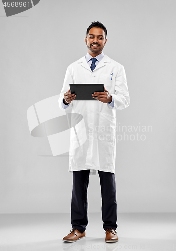 Image of indian doctor or scientist with tablet computer