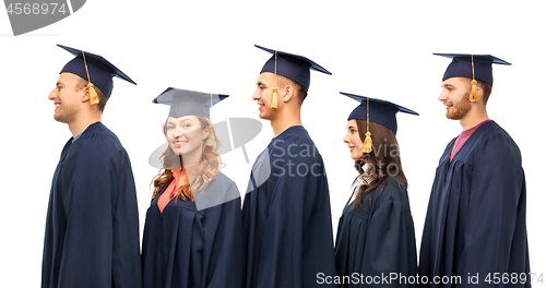 Image of graduates in mortar boards and bachelor gowns