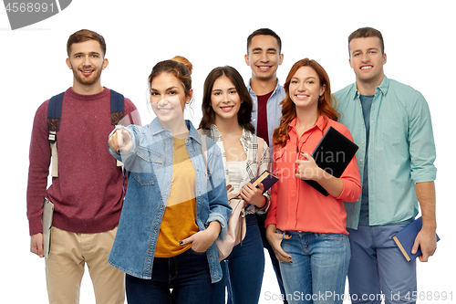 Image of group of students with books and school bags