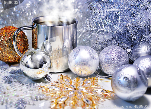 Image of Christmas decorations with a mug of hot coffee