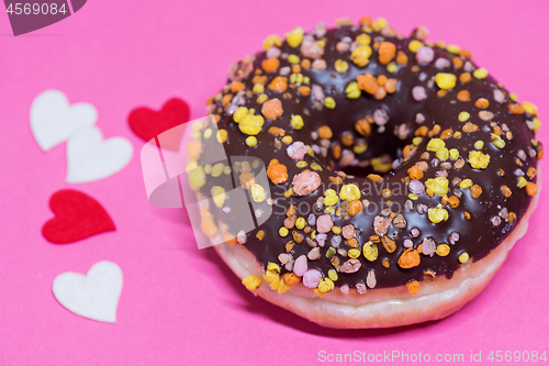 Image of Macro shoot of donut on pink