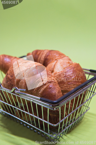 Image of Macro shoot of croissants in shopping basket