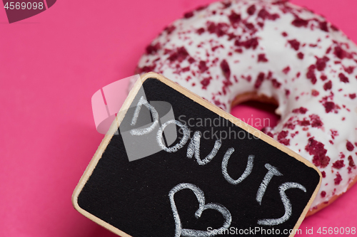 Image of Macro shoot of donut on pink