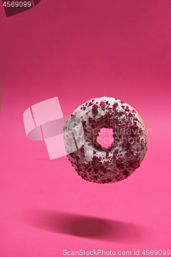 Image of Macro shoot of donut on pink