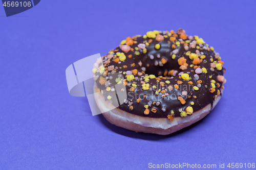 Image of Macro shoot of donut on blue