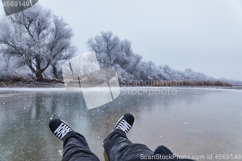 Image of Skating on a lake