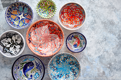 Image of Collection of empty moroccan colorful decorative ceramic bowls