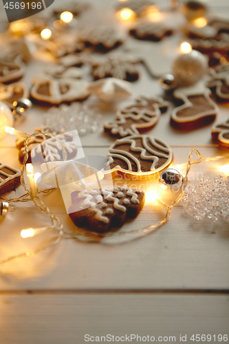 Image of Christmas sweets composition. Gingerbread cookies with xmas decorations