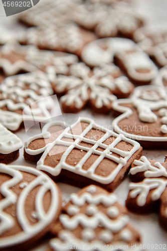 Image of Composition of delicious gingerbread cookies shaped in various Christmas symbols