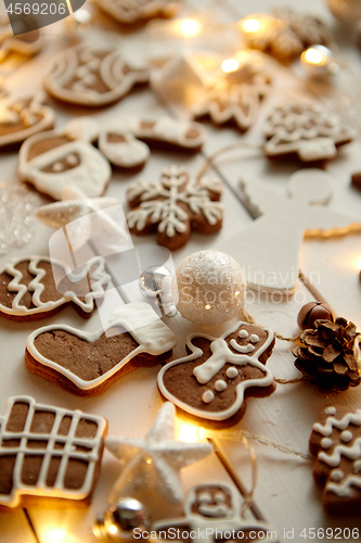 Image of Christmas sweets composition. Gingerbread cookies with xmas decorations