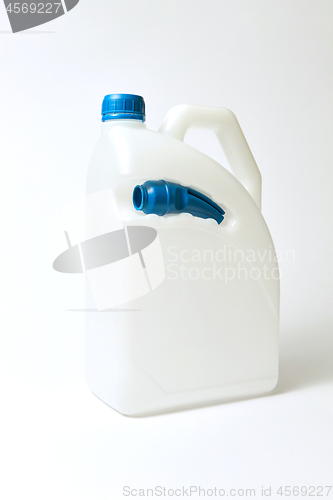 Image of Plastic white canisters mock-up for liquid on a light background.