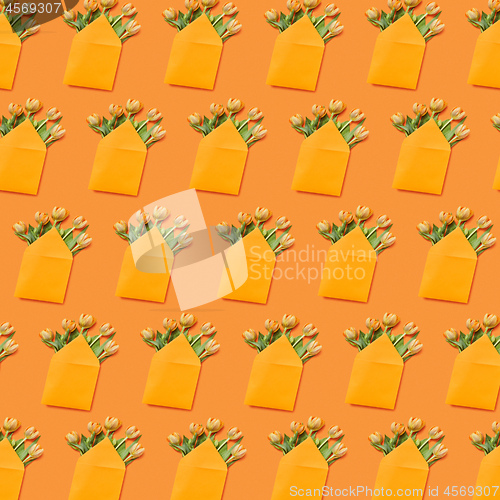 Image of Congratulations background with tulips bouquets in envelopes at yellow.