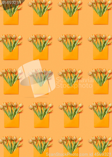 Image of Greeting envelopes pattern with tulip on a yellow background.