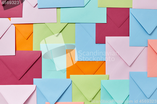 Image of Background of colorful correspondence craft envelopes.