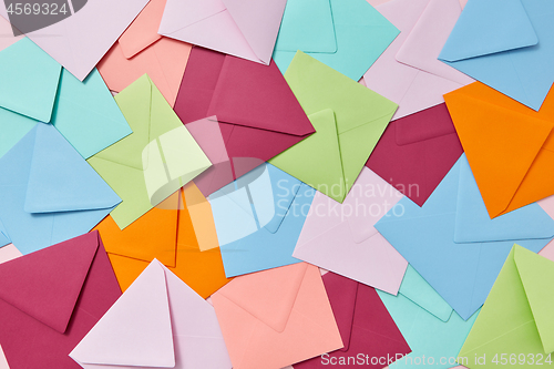 Image of Multi colored craft envelopes pattern as a background.