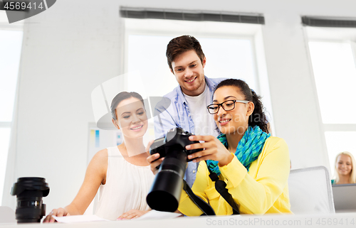 Image of photographers with camera at photo studio